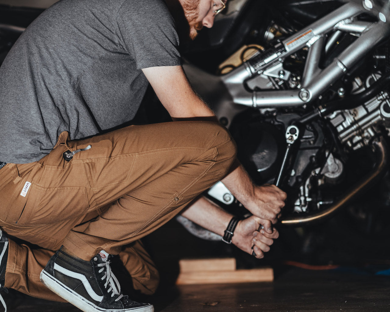 Man in LIVSN pants working